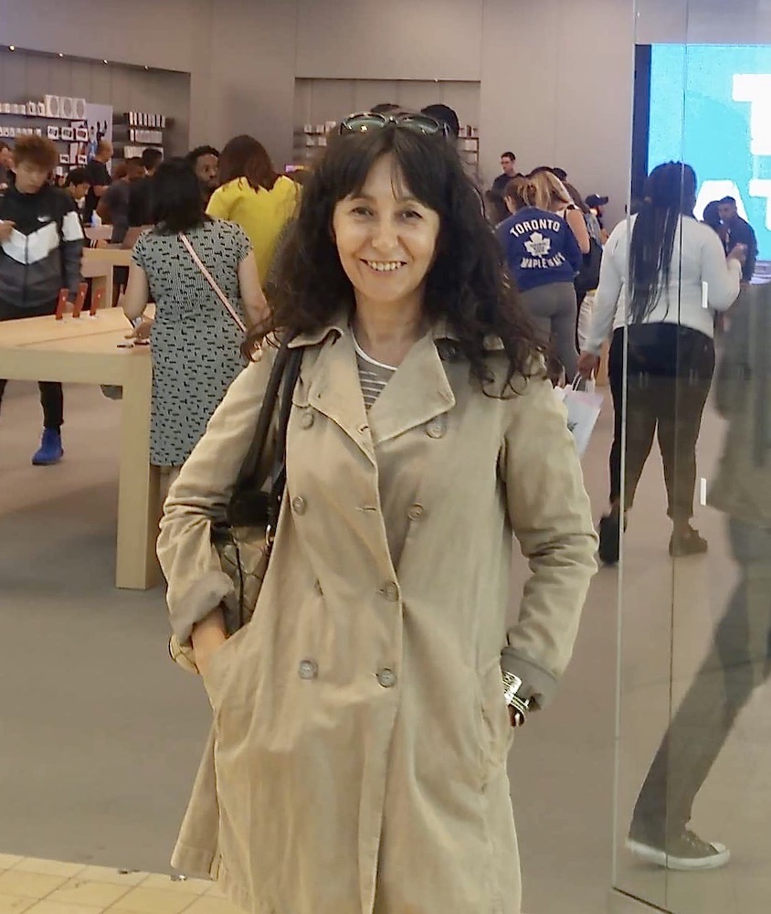 Author photo at the entrance of a store